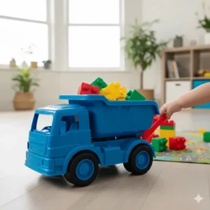 A sturdy plastic dump truck filled with large building bricks, ideal for a 3 year old's construction play.