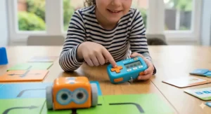 Child using the Botley 2.0 remote programmer to input coding commands.