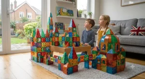 A massive, intricate fantasy castle and cityscape structure built entirely from expanded sets of magnetic building blocks, demonstrated by children.