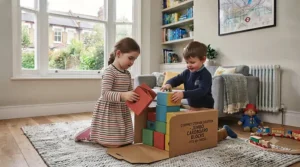 Flat-packed jumbo cardboard building blocks stacked neatly for convenient home storage.