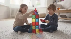 Siblings playing together, building a large rocket ship with cheap magnetic tiles.