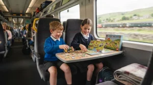 Compact portable magnetic play set keeping children entertained during a long train journey.